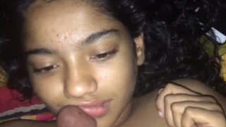 Beautiful Desi girl gives a blowjob in a video