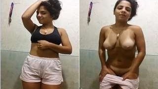 Watch a cute Indian girl from NRI get naked and flaunt her assets