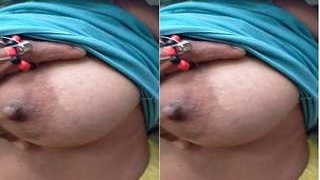 Busty Indian wife fondles her breasts in Telugu video