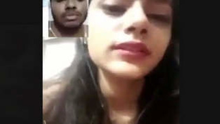 Watch as a stunning girlfriend flaunts her ample bosom in a video chat