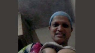 Mature Indian auntie performs on camera