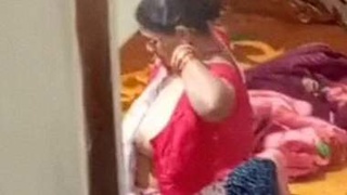 Mature Indian woman caught on camera in the nude by her nephew