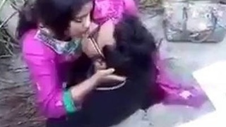 Passionate couple enjoys outdoor makeout session