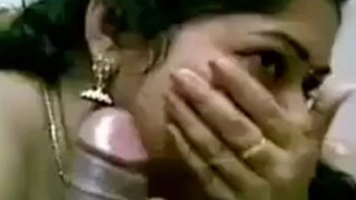 Shy south Indian wife gives a hot blowjob to her husband