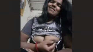 Watch a pretty Indian girl show off her big boobs in this video