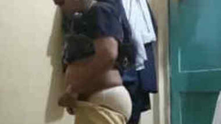 Desi wife struggles to put on her sex pants in public