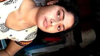 Desi babe from India showcases her XXX muff and has solo sex in her room