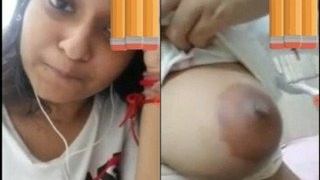 Pretty Indian girl flaunts her breasts in a video call