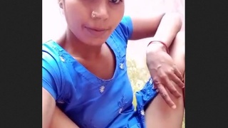 Busty desi wife in blue skirt flaunts her bushy vagina
