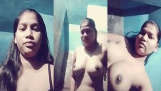 A stunning girl with big natural breasts and a hairy vagina flaunts them