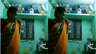Indian aunty undresses and changes clothes in hidden camera