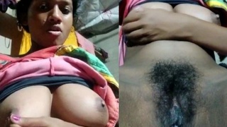 Indian woman with large breasts makes a video for her partner