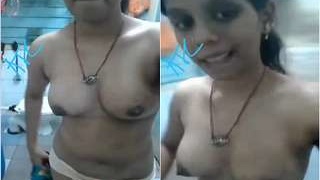 Exclusive video of cute Indian girl showing off her tits and pussy