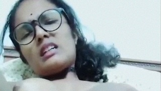 Desi nurse from Kerala masturbates in hairy pussy video