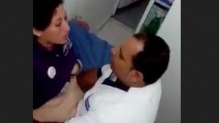 Doctor and patient engage in sexual activity in office