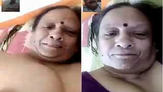 Mature woman flaunts her breasts and intimate area on VK