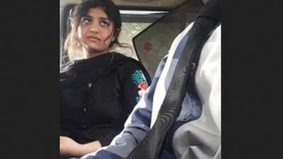 Beautiful Indian girl in a car