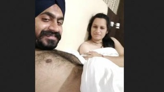 A girl and her lover in a hotel room for some steamy action