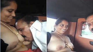 Busty Indian wife gives a titjob to her husband
