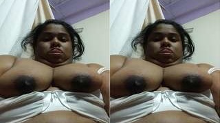 Bhabhi from India teases with her breasts in a steamy video