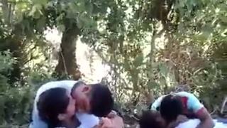 College students share passionate kisses in public while enjoying the outdoors