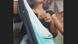 Husband squeezes and milks his wife's breasts in a show of affection