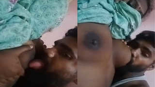 Indian wife gives oral pleasure to her husband's breasts