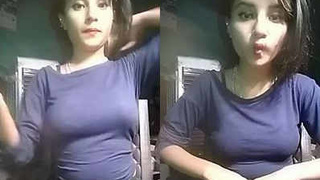 Sexy Indian girl flaunts her assets in a tight dress while on call