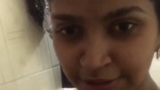Naked Indian girl takes a bath and captures her body in selfies