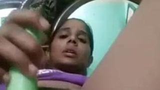 Watch an Indian woman use a brinjal as a sex toy for masturbation