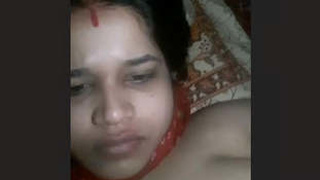 Indian bhabhi fondles her breasts and rubs them with her hands