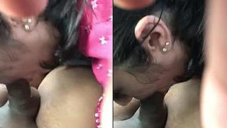 A Nigerian girl gives a blowjob in a video