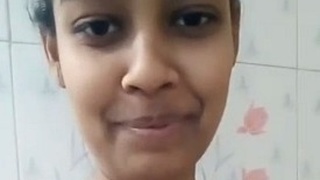 Nude Indian girl unhooks bra for solo selfie