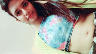 Horny teen shows off her nude body in a steamy video