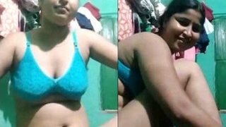 Busty Indian wife flaunts her curves in steamy video