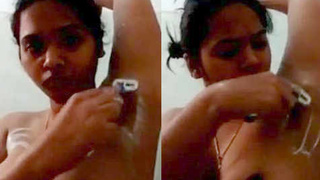 Stunning Indian girl shaves her armpits and pubic hair in a sensual video