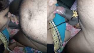 Exclusive video of Desi Budi giving a blowjob and a boob job