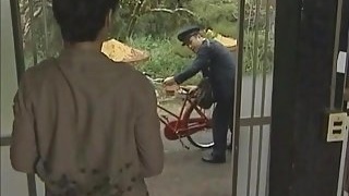 Asian postman delivers a surprise to a housewife