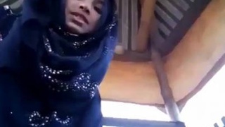 Cute hijabi teen shows off her pretty pussy in a sexy video
