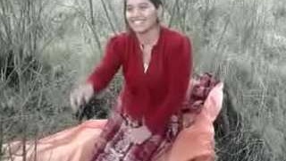 Outdoor fun with aunt and niece in a steamy video