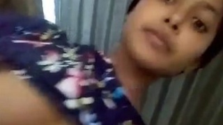 Cute Indian girl shows off her big boobs and rubs her wet pussy
