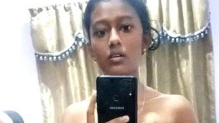 Nude Indian teen takes solo selfies and masturbates on camera