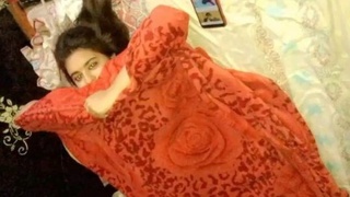 Pakistani girl gets caught on camera in a hotel room, speaking in Hindi