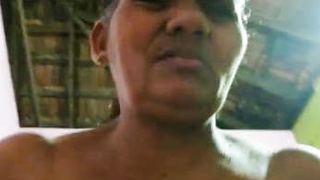 Mature aunty indulges in horny expressions with big boobs