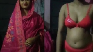 Watch a stunning Bengali wife strip down and show off her body in a naughty video
