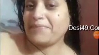 Indian aunty washes her body in front of camera