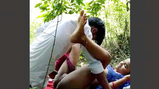 Desi couple enjoys steamy outdoor sex in village