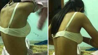 Indian girl gets seduced by a client in a video