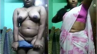 Bhabhi with big boobs strips and shows off her pussy