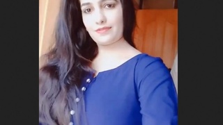 Bhabi with a curvy figure and fair skin in North Indian video